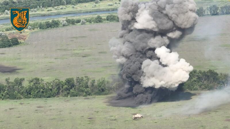 Plumes of smoke as a Ukrainian unit breaches mine defences in Zaporizhzhia region. Reuters