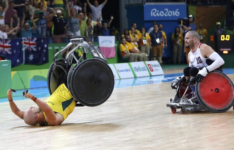 The 2016 Rio Paralympics Wheelchair Rugby final, Australia versus USA at the Carioca Arena 1 in Rio de Janeiro, Brazil. Josh Wheeler, right, of USA reacts as Ryley Batt of Australia celebrates winning gold medals. Carlos Garcia Rawlins / Reuters