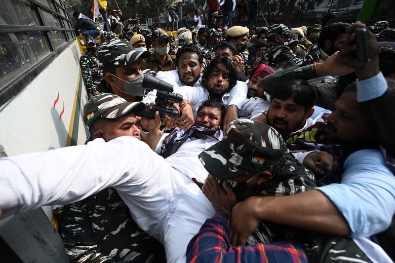 Police detain Indian Youth Congress activists in a protest against alleged surveillance operations using Israeli-built Pegasus spyware, in New Delhi. AFP
