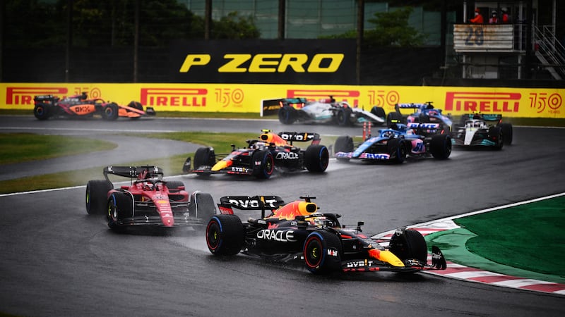 Max Verstappen leads Ferrari's Charles Leclerc during the Japanese Grand Prix. Getty