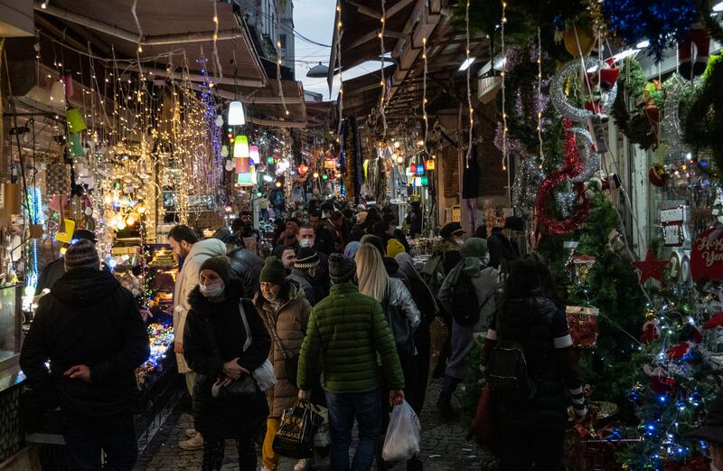 People shop at the Tahtakale Bazaar in Istanbul. EPA