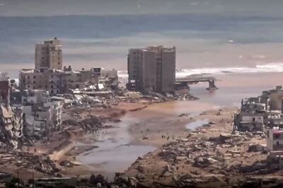 This image grab from footage published on social networks by Libyan Al Masar television channel on September 13 shows an aerial view of a extensive damage in the wake of floods after the Mediterranean storm "Daniel" hit Libya's eastern city of Derna. AFP