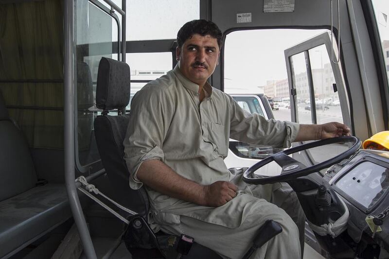 Syed Hasnain, who lives near a labour camp in Mussaffah, has been a bus driver in Abu Dhabi for eight years. Mona Al Marzooqi / The National  