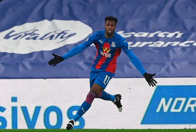 Crystal Palace's Wilfried Zaha celebrates after scoring against Leicester City on Monday. EPA