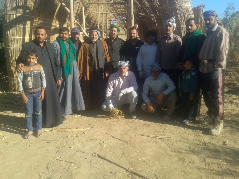 Craftsman Meeri Najim, in the middle in the second row. The craftsmen consider themselves the guardians of their unique history and culture which was nearly decimated by former dictator Saddam Hussein.  Photo: Mr Najim