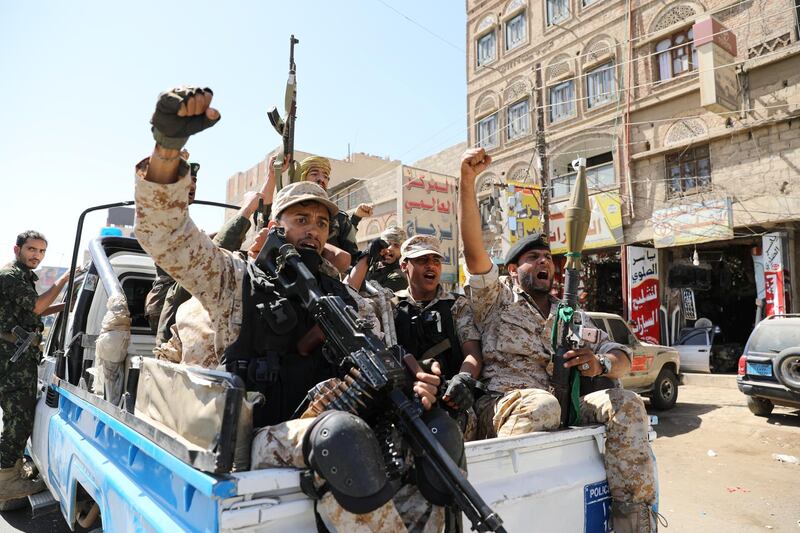 Houthi troops ride on the back of a police patrol truck after participating in a Houthi gathering in Sanaa, Yemen February 19, 2020. REUTERS/Khaled Abdullah