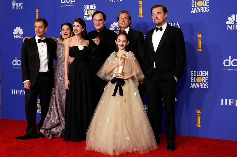 The cast of 'Once Upon A Time ... In Hollywood' pose with their Best Motion Picture - Musical or Comedy award, during the 77th annual Golden Globe Awards on January 5, 2020, at The Beverly Hilton hotel in Beverly Hills, California. Reuters