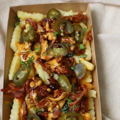 Spicy fries with Korean chicken and cheese is another dish on the 'fusion fiesta' section of the menu. Photo: Kimchi Nom Nom