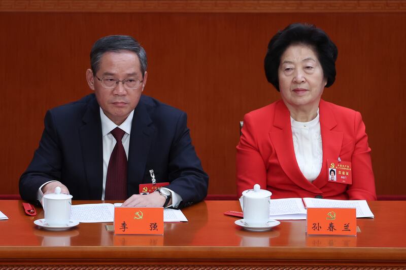 Shanghai Communist Party Secretary Li Qiang, left, and Vice Premier Sun Chunlan at the closing ceremony. Getty Images