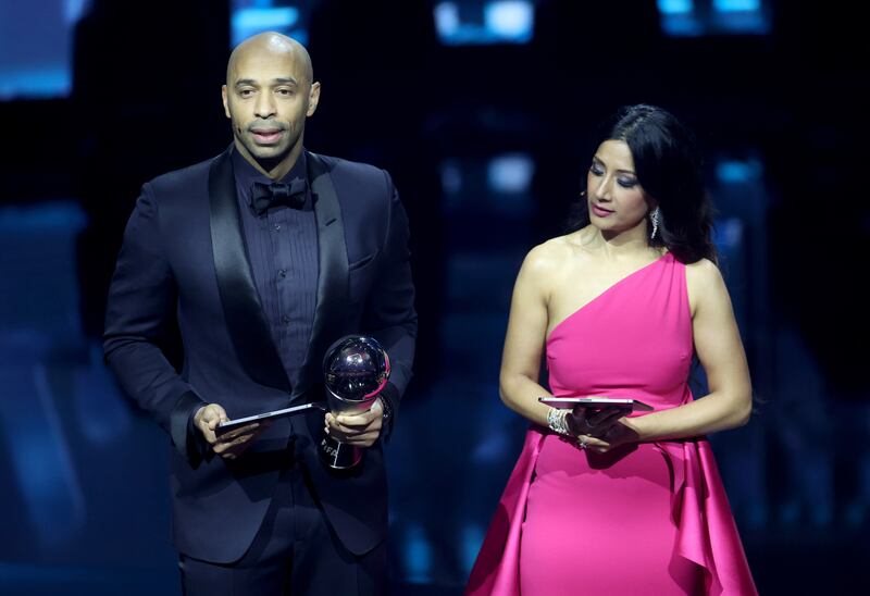 Awards show hosts Thierry Henry and Reshmin Chowdhury announce Lionel Messi as the winner of the Best Fifa Men's Player in London. Messi was not present at the ceremony, with his award collected instead by Henry. EPA 