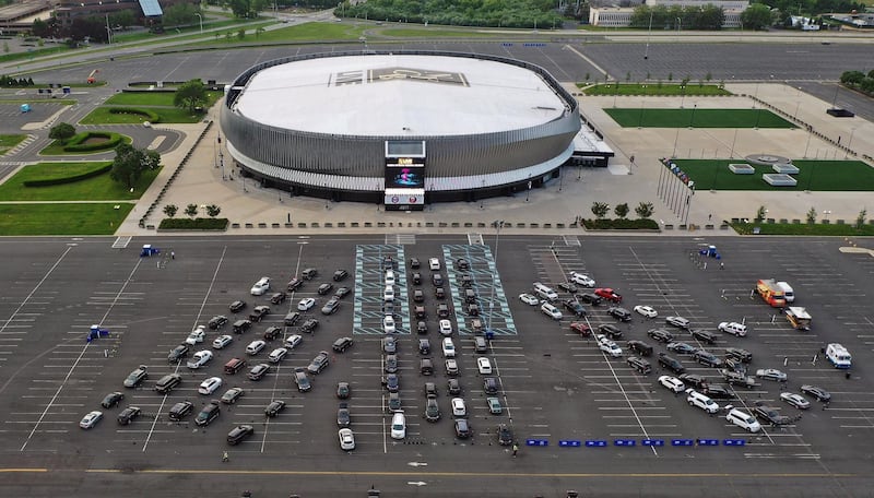 An aerial view of residents watching the movie 'Trolls' at a drive-in movie arranged by Nassau County at the parking lot of NYCB's LIVE at the Nassau Coliseum in Uniondale, New York. Getty Images