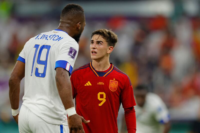 Costa Rica defender Kendall Waston clashes with Spain's Gavi. AFP