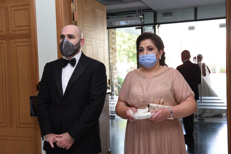 Groom Elie Abi Daher with his mother Norma Estephan. Eli married to Laura Daher in a small service at St Therese Church in Abu Dhabi on August 17 following safety rules amid the coronavirus pandemic. Courtesy: Laura Daher and Elie Abi Daher