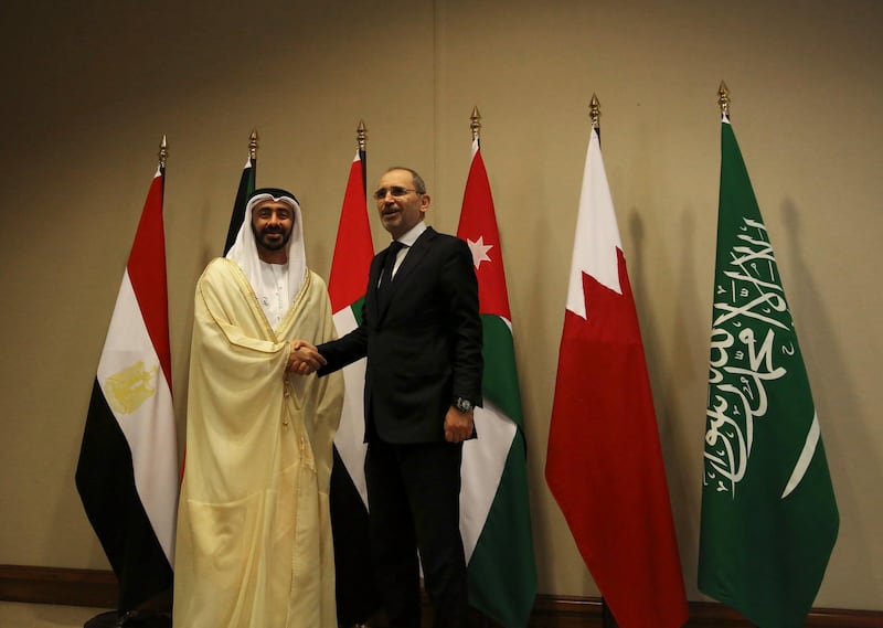 UAE Minister of Foreign Affairs and International Co-operation Sheikh Abdullah bin Zayed, left, and his Jordanian counterpart Ayman Safadi pose for a photograph before the Ministerial Consultative meeting in the Dead Sea, in Jordan. EPA