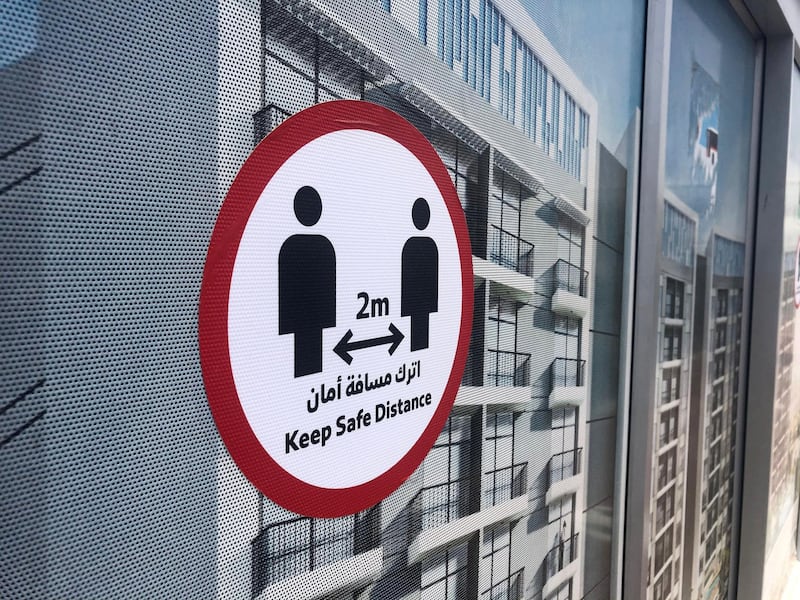 Dubai, United Arab Emirates - Reporter: N/A. Business. General view of a Safe distance sign at a bus station. Tuesday, July 21st, 2020. Dubai. Chris Whiteoak / The National