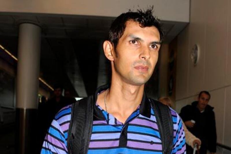 Pakistan's wicketkeeper Zulqarnain Haider arrives at London's Heathrow Airport from Dubai, Monday Nov. 8, 2010, after skipping his team's one-day match against South Africa in Dubai. Haider flew from the United Arab Emirates where he had been scheduled to play in the deciding one-day international in the series against South Africa. Team officials had reported Haider as missing to police and the International Cricket Council's anti-corruption and security unit. (AP Photo) ** UNITED KINGDOM OUT NO SALES  NO MAGS **