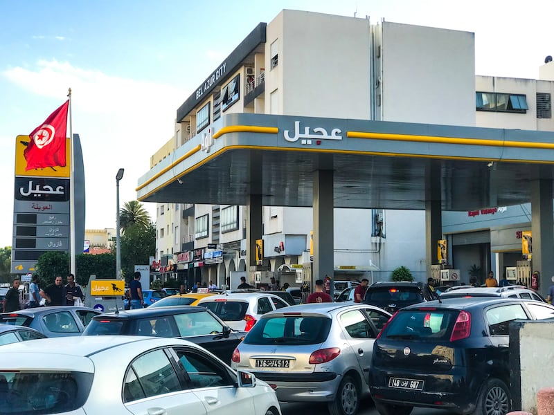 Cars queue at a petrol station in Tunis. Ghaya Ben Mbarek/The National