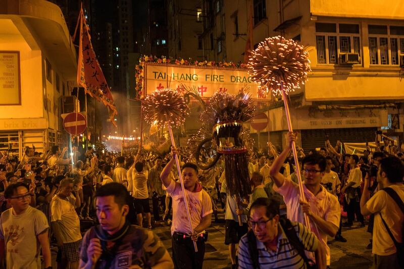 In the 19th century the people in the village of Tai Hang believed they miraculously stopped a plague with a fire dragon dance.