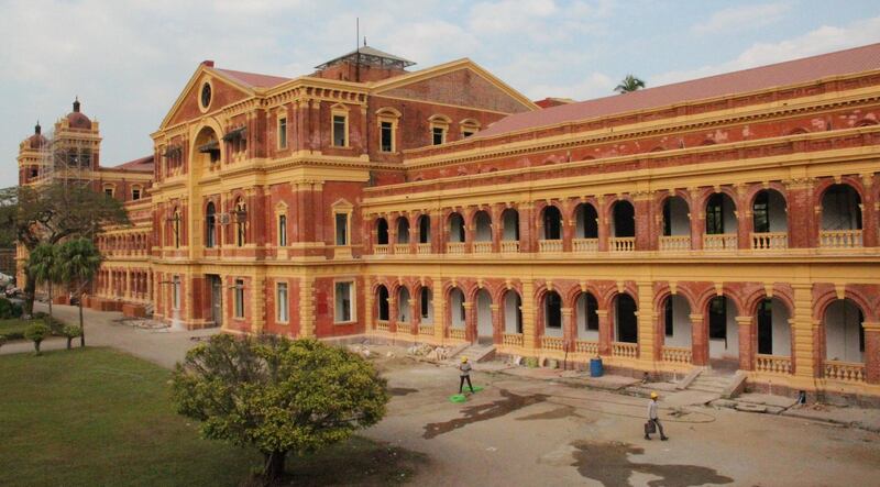 Construction workers busy at Yangon's soon-to-be renovated Secretariat builidng. Photo by Stephen Starr