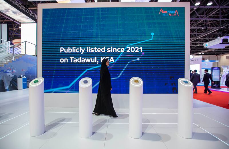 The Acwa Power stand at Wetex in Dubai. The company is aiming for about 120 gigawatts of power-generating capacity in the next 10 years. Ruel Pableo / The National