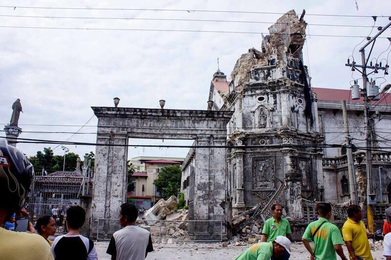 Filipinos view the historic church of 'Santo Nino' Cathedral destroyed by a 7.2-magnitude earthquake in Cebu City, Philippines, 15 October 2013. EPA/Romaldo Mico Solon