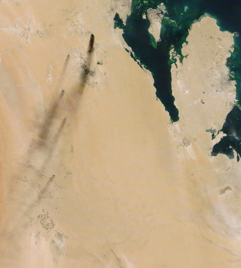 epa07844134 A handout photo made available by NASA Worldview shows a satellite image of smoke from fires at two major oil installations in eastern Saudi Arabia, 14 September 2019 (issued 15 September 2019), following alleged drone attacks claimed by Yemen's Houthi rebels. According to Saudi state-owned oil company Aramco, two of its oil facilities in Saudi Arabia, Khurais and Abqaiq, were set on fire on 14 September after allegedly having been targeted by drone attacks. In picture is seen Bahrain (island, C-top) and Qatar (peninsula, R).  EPA/NASA WORLDVIEW HANDOUT  HANDOUT EDITORIAL USE ONLY/NO SALES