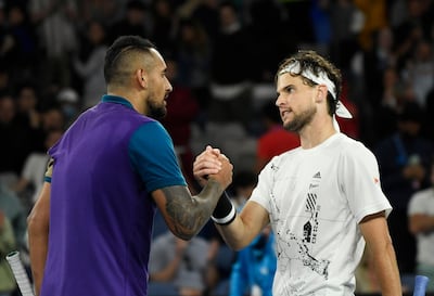 Tennis - Australian Open - Melbourne Park, Melbourne, Australia, February 12, 2021 Austria's Dominic Thiem with Australia's Nick Kyrgios after winning their third round match REUTERS/Jaimi Joy