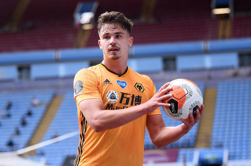 BIRMINGHAM, ENGLAND - JUNE 27: Leander Dendoncker of Wolverhampton Wanderers prepares to take a throw in during the Premier League match between Aston Villa and Wolverhampton Wanderers at Villa Park on June 27, 2020 in Birmingham, England. (Photo by Laurence Griffiths/Getty Images)