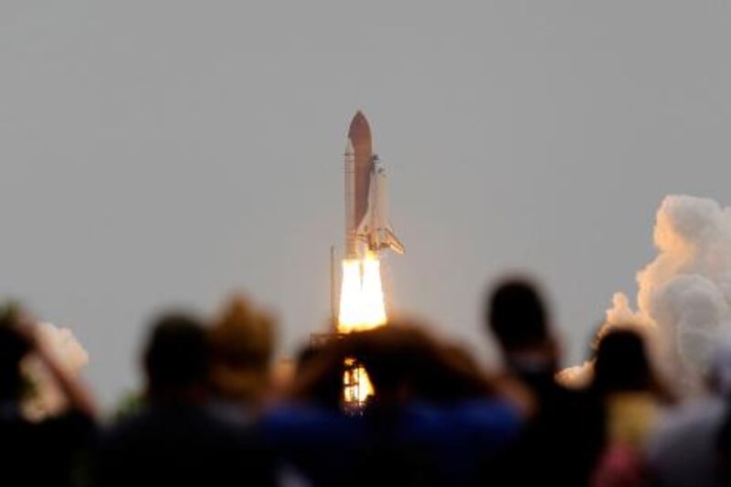 The space shuttle Atlantis, STS-135 lifts off from launch pad 39A at the Kennedy Space Center in Cape Canaveral, Florida, July 8, 2011. The 12-day mission to the International Space Station is the last mission in the Space Shuttle program. REUTERS/Gary Hershorn (UNITED STATES - Tags: TRANSPORT SCI TECH) *** Local Caption ***  KSC501_SPACE-SHUTTL_0708_11.JPG