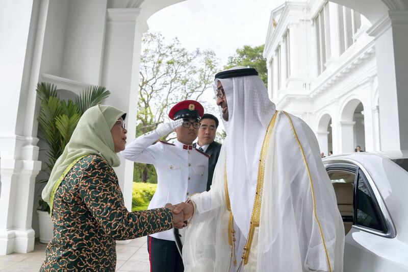 SINGAPORE, SINGAPORE - February 28, 2019: HE Halimah Yacob, President of Singapore (L) receives HH Sheikh Mohamed bin Zayed Al Nahyan, Crown Prince of Abu Dhabi and Deputy Supreme Commander of the UAE Armed Forces (R), at the Istana presidential palace.
( Mohamed Al Hammadi / Ministry of Presidential Affairs )
—