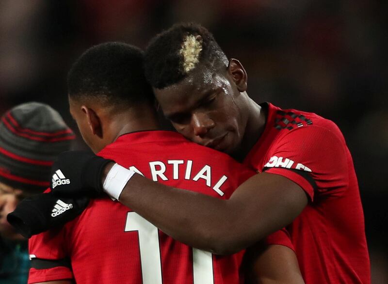 Manchester United's Anthony Martial and Paul Pogba celebrate after the match. Action Images via Reuters