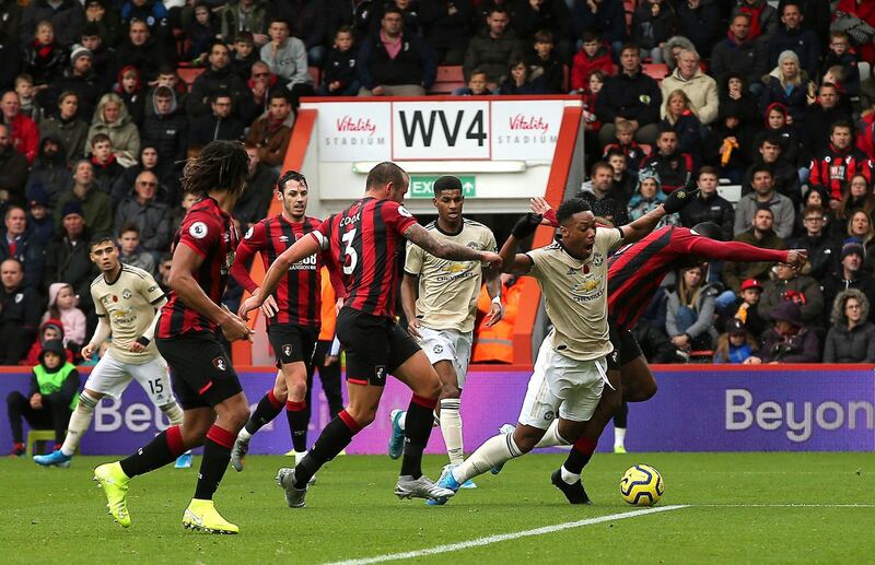 Anthony Martial, second right, is challenged by Bournemouth's Jefferson Lerma. PA