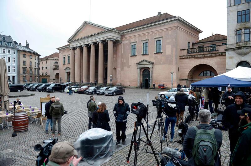 Members of the media set up in front of a courthouse in Copenhagen, on April 25, 2018.
A Copenhagen court is to rule Wednesday, April 25, 2018, whether Danish submarine builder Peter Madsen murdered Swedish journalist Kim Wall onboard his vessel before chopping up her corpse and tossing the body parts into the sea last year. / AFP PHOTO / Ritzau Scanpix / Mads Claus Rasmussen / Denmark OUT