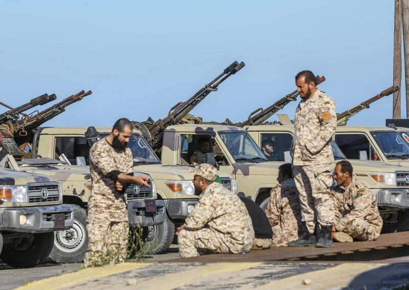 Forces loyal to Libya's UN-backed unity government arrive in Tajura, a coastal suburb of the Libyan capital Tripoli, on April 6, 2019, from their base in Misrata. Anti-government forces led by Libyan strongman Khalifa Haftar said Saturday they had been targeted by an air strike about 50 kilometres (30 miles) south of Tripoli. / AFP / Mahmud TURKIA
