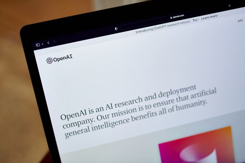 The OpenAI website on a laptop computer. Its artificial intelligence bot ChatGPT has gone viral. Bloomberg