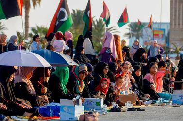 Libyan Muslims gather to perform the Eid Al-Adha morning prayer at the Martyrs Square of the capital Tripoli on August 11, 2019. AFP