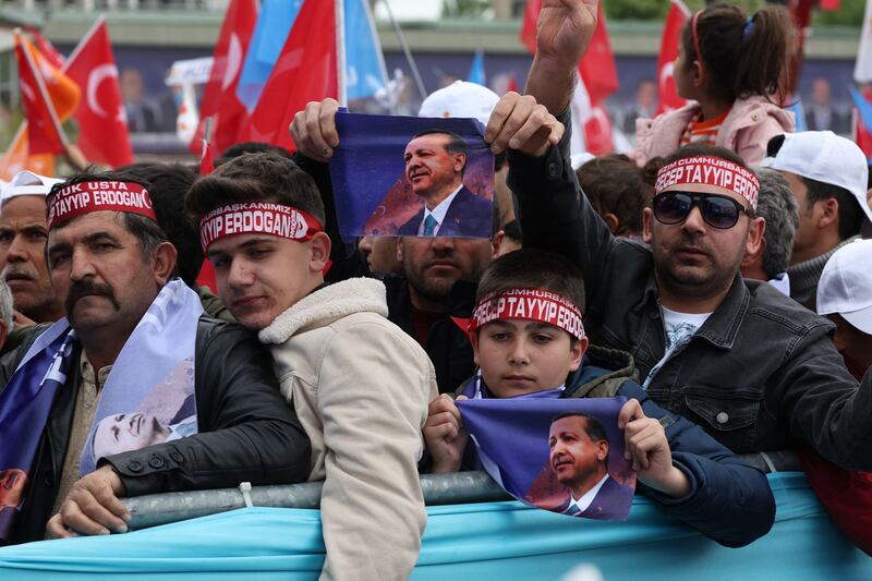 Supporters of Mr Erdogan at the Ankara rally. AFP