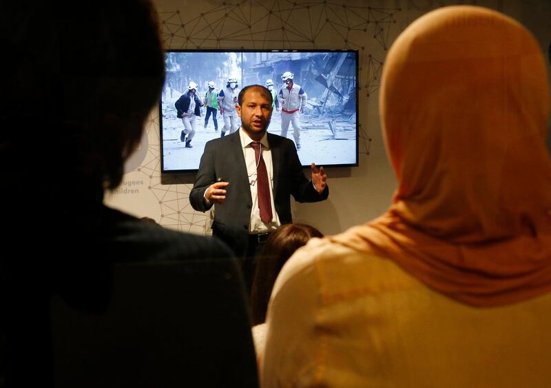 Attendees listen to Raed Saleh, Head of the White Helmets during his presentation "What is really happening inside Aleppo?" at the Humanitarian Hub during the World Economic Forum (WEF) annual meeting in Davos, Switzerland January 19, 2017.  REUTERS/Ruben Sprich - LR1ED1J0SZVLZ