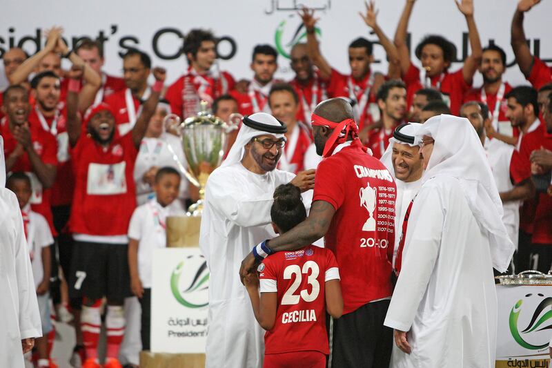 ABU DHABI , UNITED ARAB EMIRATES Ð May 28 , 2013 : Sheikh Mohammed Bin Zayed Al Nahyan , Crown Prince of Abu Dhabi giving medal to Grafite ( no 23 red ) during the presentation of President Cup final match between Al Ahli vs Al Shabab at Mohammed Bin Zayed Stadium in Abu Dhabi. Al Ahli won the match by 4-3. ( Pawan Singh / The National ) For Sports