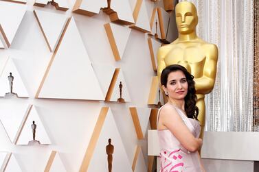 Waad al-Kateab poses on the red carpet during the Oscars arrivals at the 92nd Academy Awards in Hollywood, Los Angeles, California, U.S., February 9, 2020. REUTERS/Mike Blake