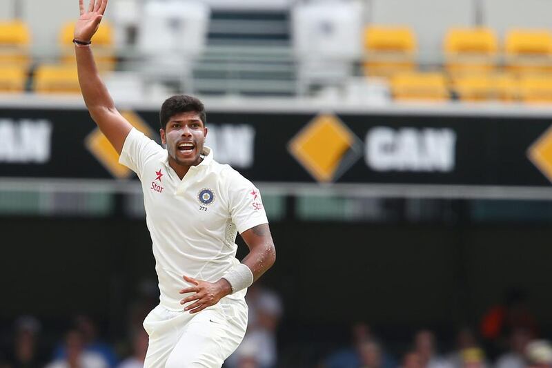 Umesh Yadav of India appeals successfully for a catch against Chris Rogers of Australia on Day 2 of the second Test at the Gabba on Thursday. Tertius Pickard / AP / December 18, 2014