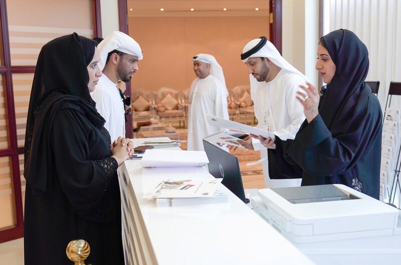 Abu Dhabi, United Arab Emirates, August 18, 2019.  Emiratis registering themselves for FNC elections at the Abu Dhabi Chamber of Commerce & Industry Building.  --  The first batch of Emirati registrants at the centre.
Victor Besa/The National
Section:  NA
Reporter:  Haneen Dajani