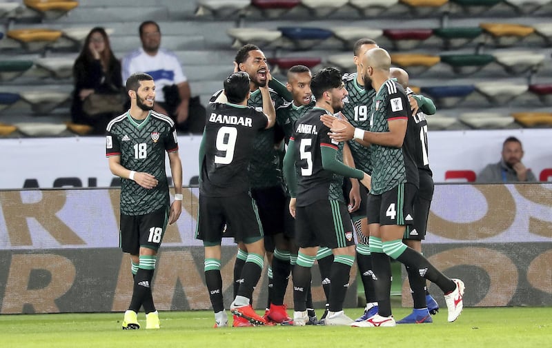 ABU DHABI , UNITED ARAB EMIRATES , January 21 – 2019 :- Khamis Esmaeel Zayed ( no 13 in green center ) celebrating after scoring the first goal during the AFC Asian Cup UAE 2019 football match between UNITED ARAB EMIRATES vs. KYRGYZ REPUBLIC held at Zayed Sports City in Abu Dhabi. ( Pawan Singh / The National ) For News/Sports