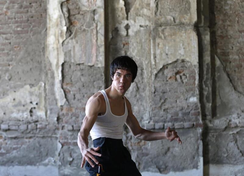 From the ruins of an iconic bombed-out palace above Kabul, the young Afghan man bearing a striking resemblance to kung fu legend Bruce Lee is high-kicking his way to internet fame, aiming to show another side to his war-weary nation. Mohammad Ismail / Reuters