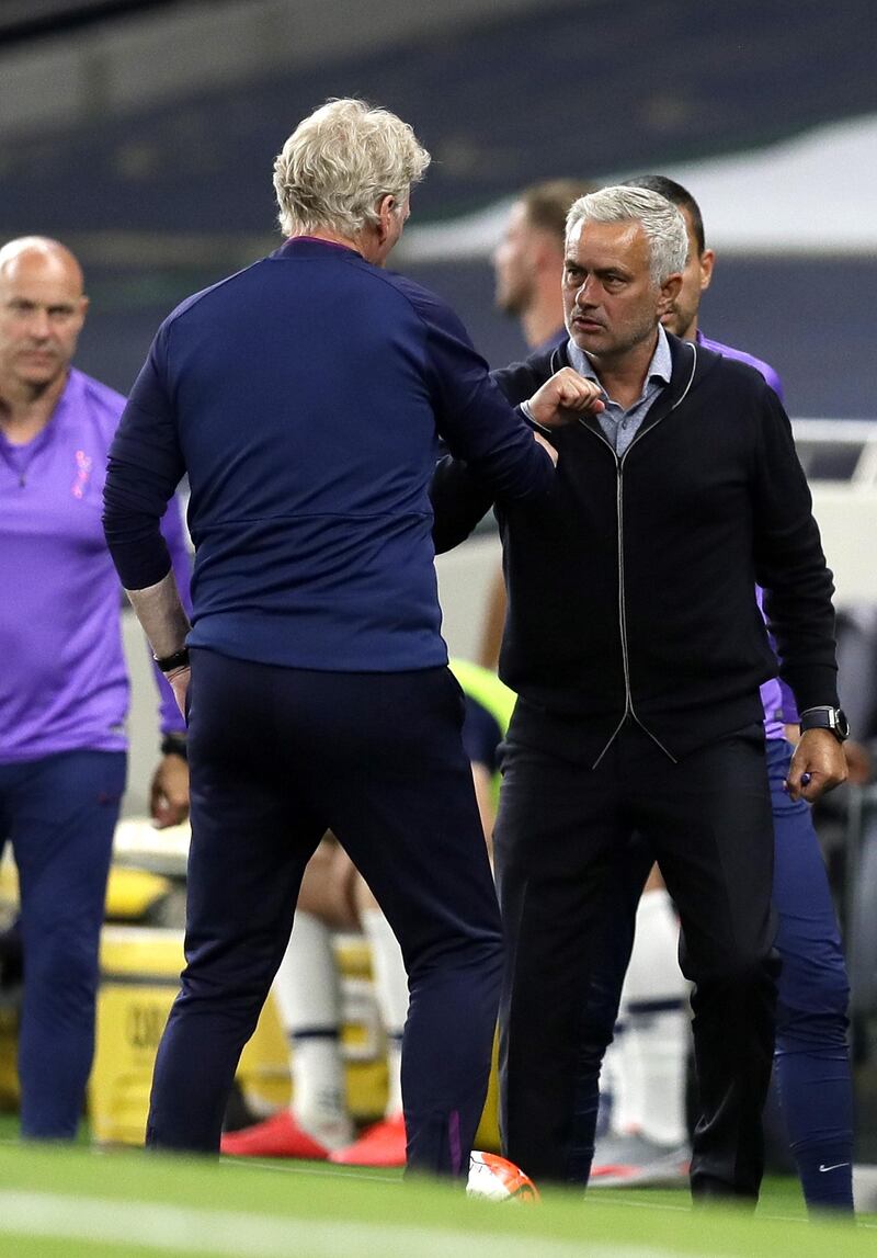 Tottenham manager Jose Mourinho (R) and West Ham's David Moyes after the match. EPA