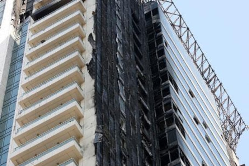 Dubai Police says the Tamweel Tower fire was started by a discarded cigarette butt that ignited piled-up rubbish.
