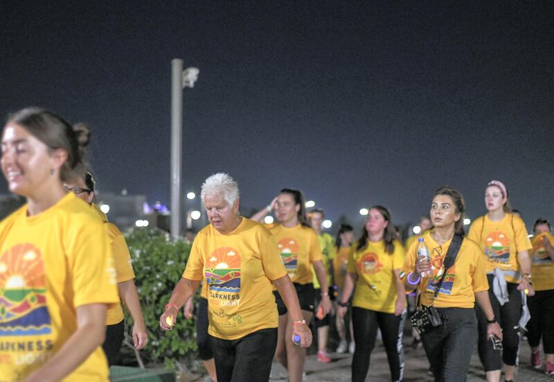 Abu Dhabi, United Arab Emirates - This year 1,700 people took part in the ÔDarkness into LightÕ walk at Emirates Palace. Khushnum Bhandari for The National