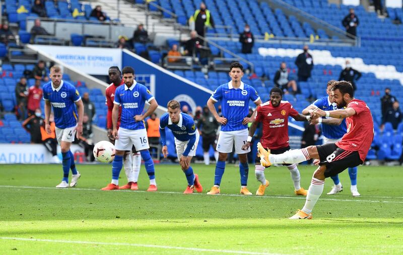 Bruno Fernandes of Manchester United scores his sides third goal from the penalty spot against Brighton. Getty