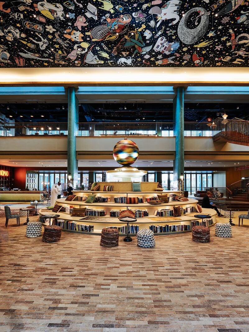 The hotel's lobby with ceiling artwork by Dominik Bulka.