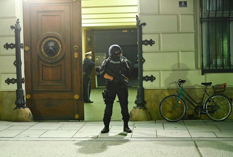An armed policeman outside the Interior Ministry in the centre of Vienna. AFP